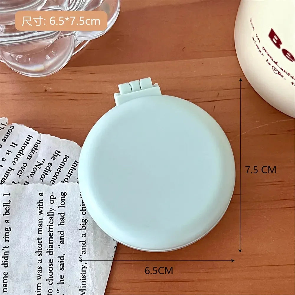 Portable Folding Hair Comb with Mirror – Compact Air Cushion Brush for Women & Girls